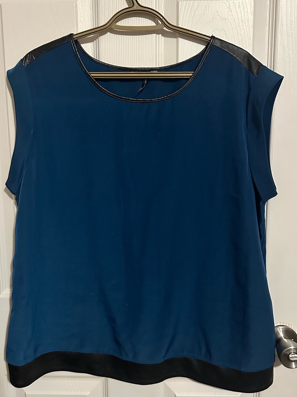 Amanda Green Blue Sleeveless Shirt with Black Trim